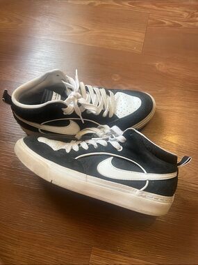 Nike Black and White Low-Top Sneakers with White Swoosh